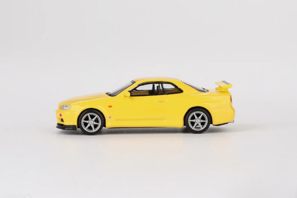 NISSAN Skyline GT-R (R34) V-Spec 1999 Yellow - MiniGT Scale 1:64 ...